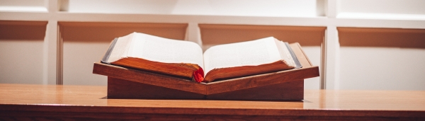 open bible on a pulpit